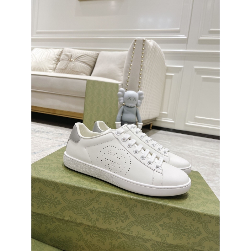 G*u*i sneakers